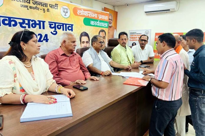 BJP leaders listening public grievances at party office Jammu on Monday.