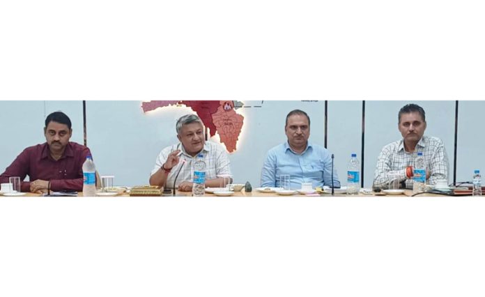 DC Reasi Vishesh Mahajan chairing a meeting on Saturday. DC Reasi Vishesh Mahajan chairing a meeting on Saturday.