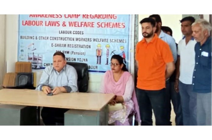 Ration cards being given to e-shram registrants at Rajouri on Friday. Ration cards being given to e-shram registrants at Rajouri on Friday.