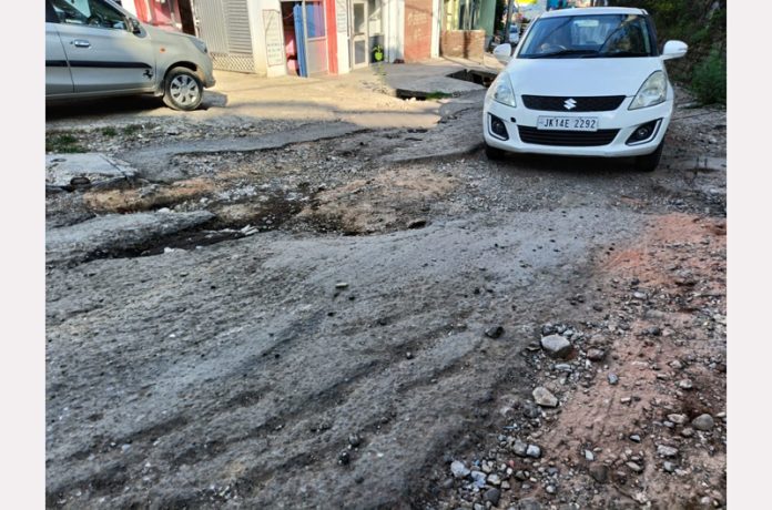 Badly damaged Jail Road, which needs immediate repair. -Excelsior/ K Kumar