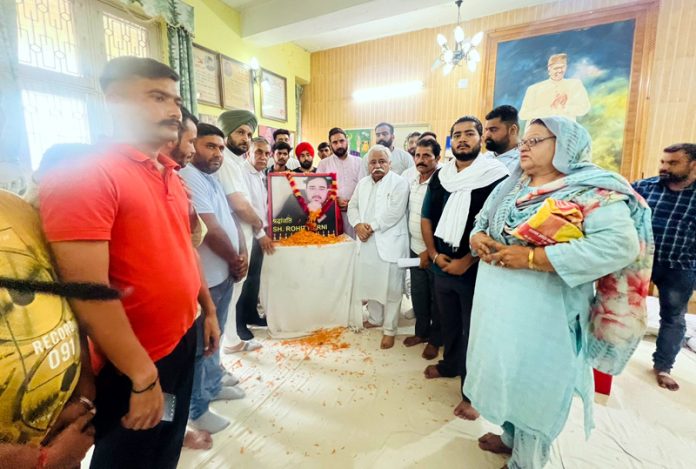 NC functionaries paying tribute to Distt president Jammu Lt Rohit Kerni.