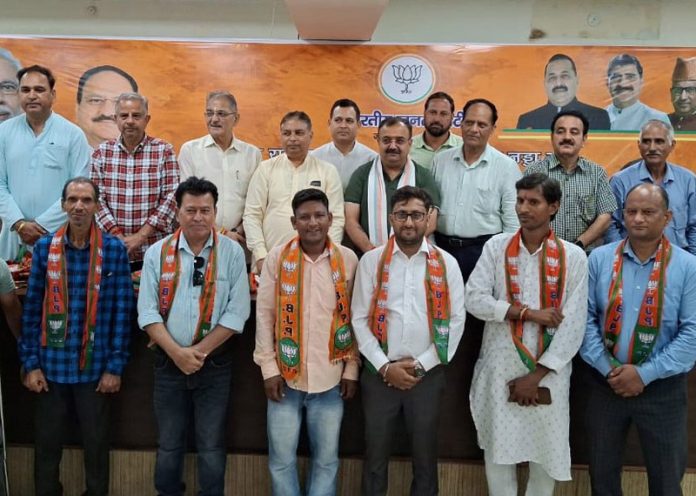 New entrants who joined BJP posing with senior party leaders at Jammu on Friday.