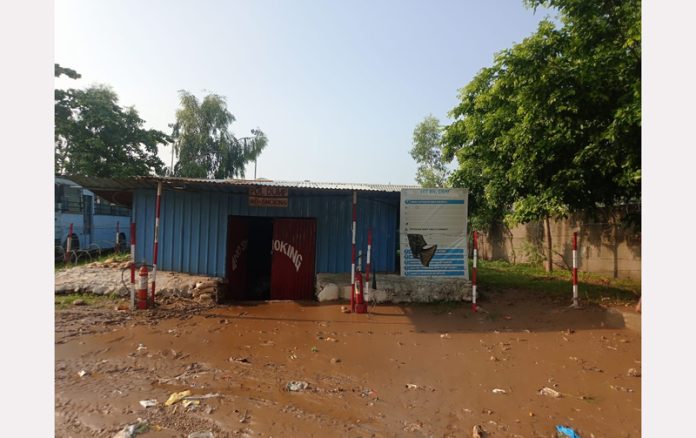 A CRPF building submerged in the debris of drain water at Channi Rama, Jammu.