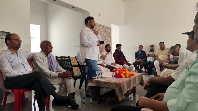 page9-6 Cong leader Satish Sharma addressing public meeting in Akhnoor.