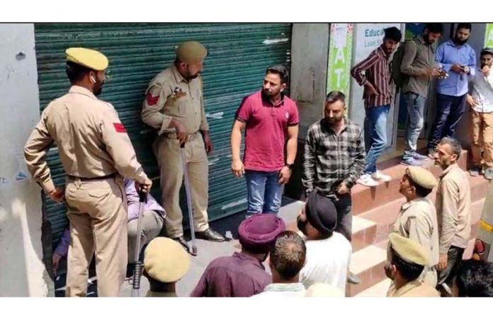 Computer shop being seized by the local administration. -Excelsior/Wasim Computer shop being seized by the local administration. -Excelsior/Wasim