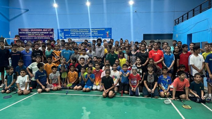 Young badminton players posing along with dignitaries during opening ceremony of district championship at MA Stadium Jammu. Young badminton players posing along with dignitaries during opening ceremony of district championship at MA Stadium Jammu.