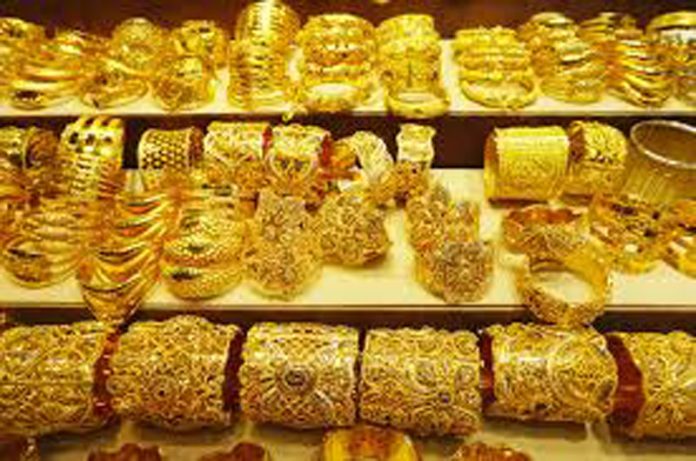 Gold prices remain flat, silver falls