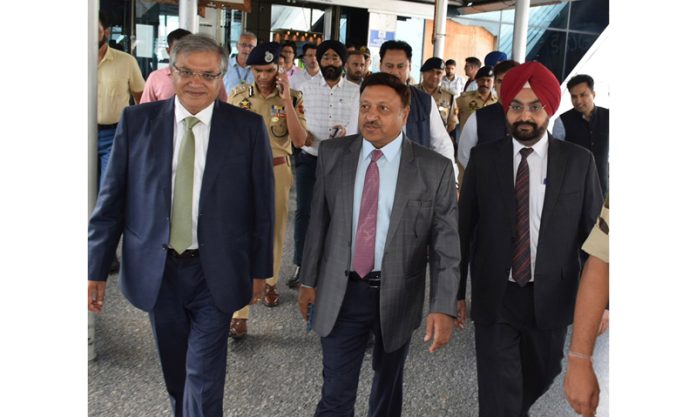 An ECI delegation led by CEC Rajiv Kumar and ECs Gyanesh Kumar and Dr S S Sandhu arrives to review poll preparedness in Srinagar on Thursday. An ECI delegation led by CEC Rajiv Kumar and ECs Gyanesh Kumar and Dr S S Sandhu arrives to review poll preparedness in Srinagar on Thursday.