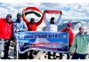 A team of climbers from Mountaineering Association of J&K posing along with the national flag on top of Kangri peak in Ladakh UT.
