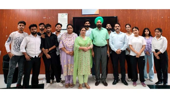 Winners of essay writing competition posing for photograph with Principal and staff of Commerce College. Winners of essay writing competition posing for photograph with Principal and staff of Commerce College.