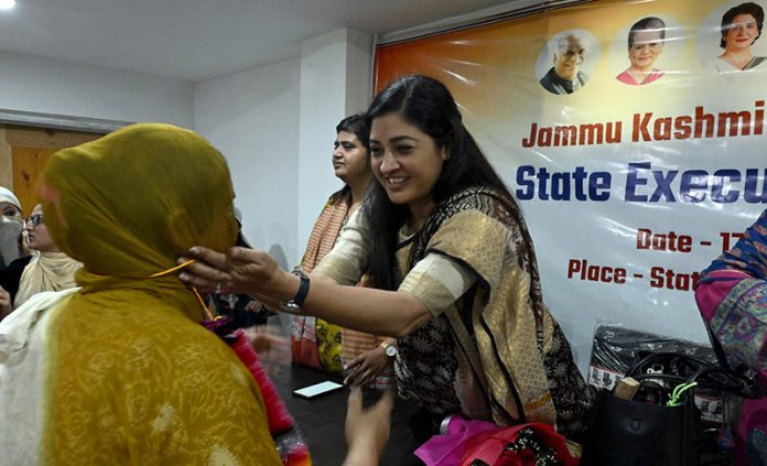 Alka Lamba, National President of the All India Mahila Congress distributing sweets to workers at Srinagar Congress Office on Saturday. -Excelsior/Shakeel Alka Lamba, National President of the All India Mahila Congress distributing sweets to workers at Srinagar Congress Office on Saturday. -Excelsior/Shakeel