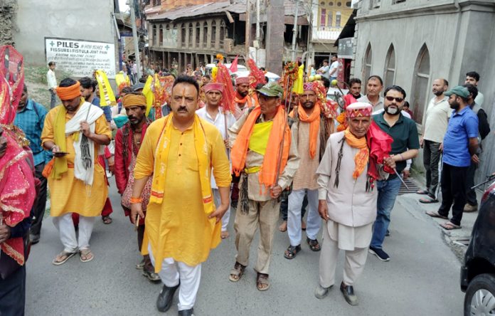 Devotees of annual Mani Mahesh Yatra leaving Bhaderwah for the pilgrimage in Bharmour, HP. -Excelsior/Tilak Raj