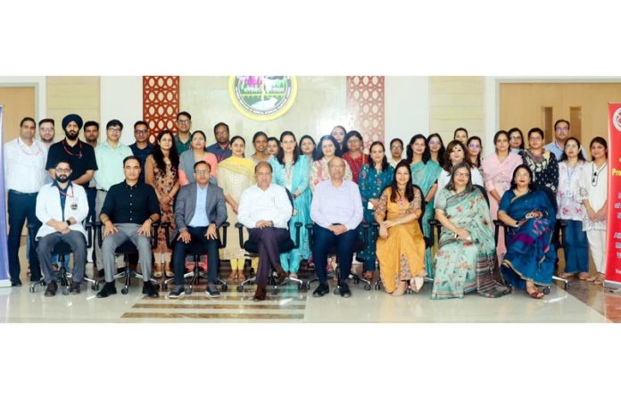 ED & CEO of AIIMS Jammu, Dr Shakti Kumar Gupta and Hemovigilance experts posing with participants of a CME program. ED & CEO of AIIMS Jammu, Dr Shakti Kumar Gupta and Hemovigilance experts posing with participants of a CME program.