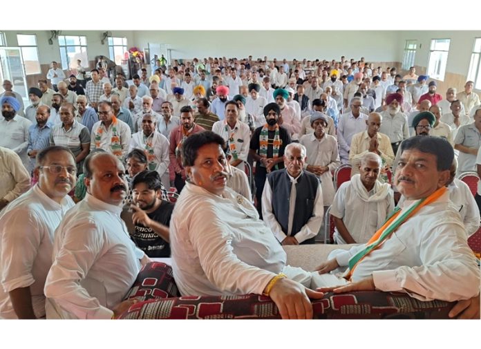 Raman Bhalla and other Congress leaders during an interaction with party workers in Swankha, Ramgarh constituency on Saturday.