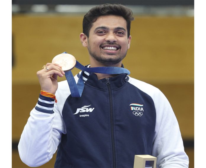CHATEAUROUX-- Bronze medalist Swapnil Kusale of India attends the awarding ceremony after the 50m rifle 3 positions men's final of shooting at the Paris 2024 Olympic Games in Chateauroux, France, Aug. 1, Aug. 1, 2024 (UNI/Xinhua)