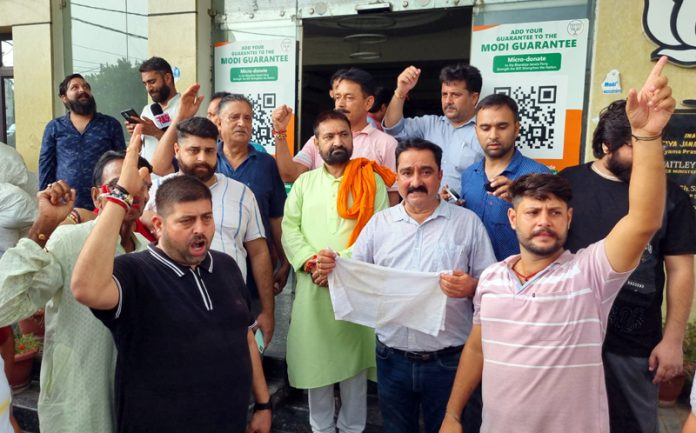 BJP activists protesting in front of party headquarters at Jammu on Monday. -Excelsior/Rakesh