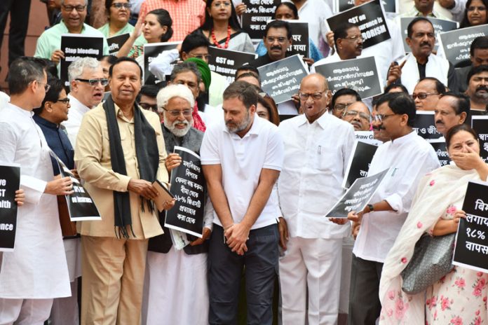 INDIA bloc MPs protest against the Central Government outside Makar Dwar in Parliament House on Tuesday. (UNI) INDIA bloc MPs protest against the Central Government outside Makar Dwar in Parliament House on Tuesday. (UNI)