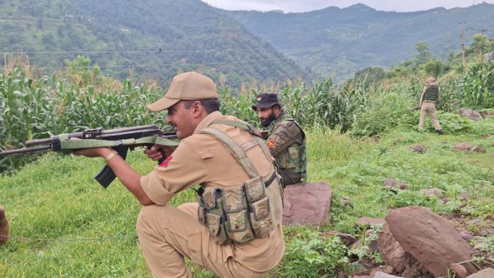 Security personnel during searches near the encounter site in Rajouri. - Excelsior/Imran