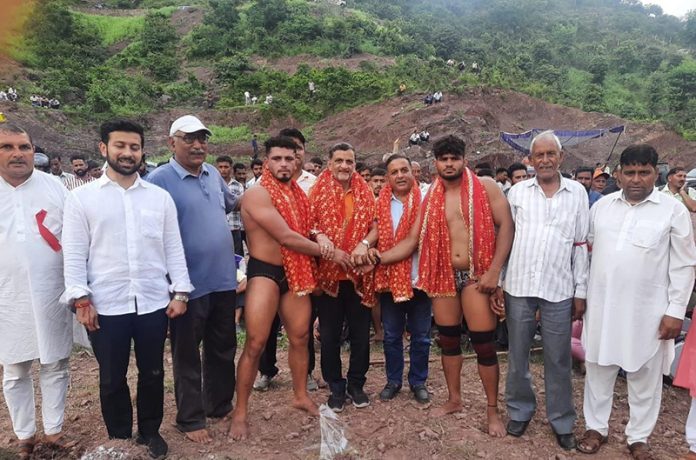 Dignitary introducing wrestlers before Dangal at Kalakote. Dignitary introducing wrestlers before Dangal at Kalakote.