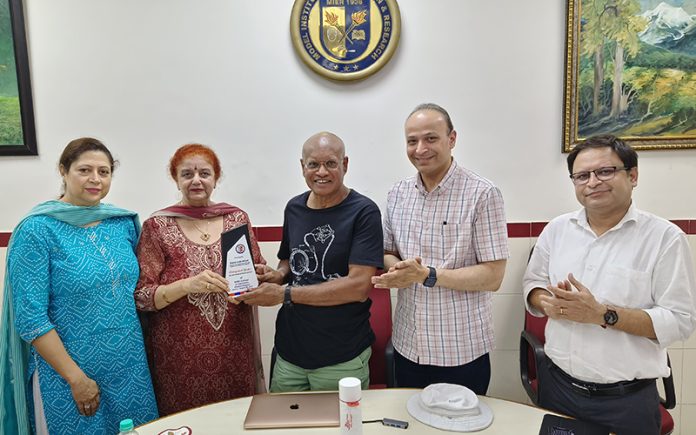 MIER College of Education management presenting memento to the chief guest. MIER College of Education management presenting memento to the chief guest.