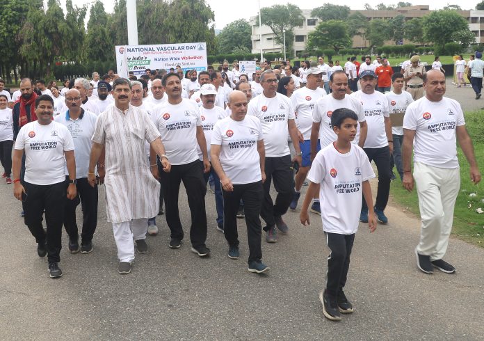 MP Jugal Kishore participating in Walkathon at Jammu organised by Vascular Society of India at Jammu University on Sunday. -Excelsior/Rakesh MP Jugal Kishore participating in Walkathon at Jammu organised by Vascular Society of India at Jammu University on Sunday. -Excelsior/Rakesh