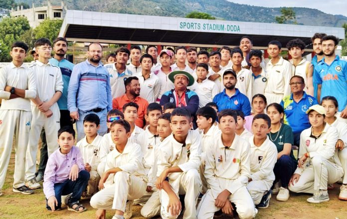 IPL star Iqbal Abdullah posing along with aspiring youth during cricket coaching at Doda. IPL star Iqbal Abdullah posing along with aspiring youth during cricket coaching at Doda.