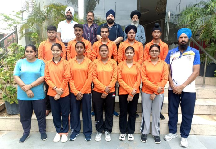 Selected players of Jammu & Kashmir Tug-Of-War posing before leaving for National Championship at Jammu on Saturday.