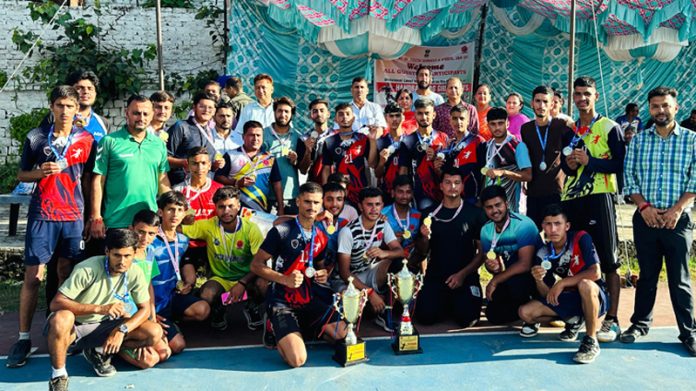 Handball players posing with trophies during closing ceremony at Udhampur. Handball players posing with trophies during closing ceremony at Udhampur.