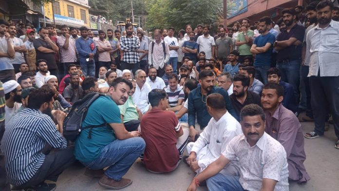Locals of Maitra, Ramban during a protest against the opening of liquor shop. Locals of Maitra, Ramban during a protest against the opening of liquor shop.