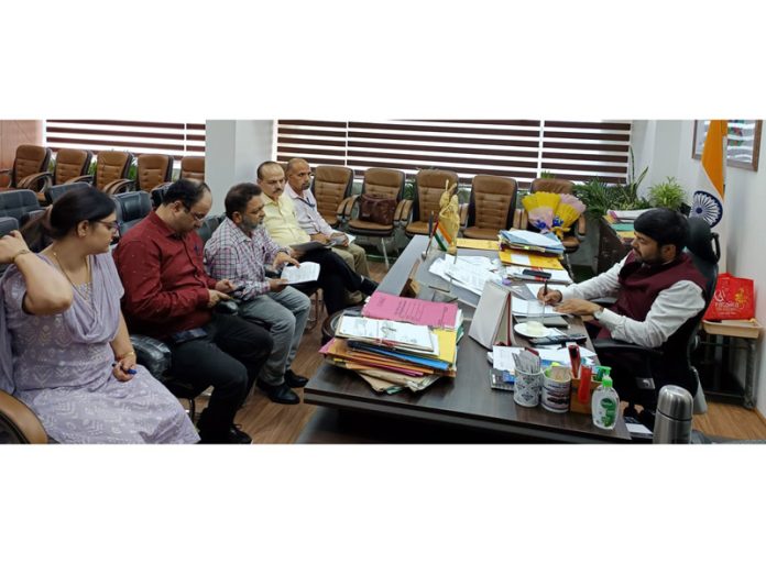 JMC Commissioner Dr Devansh Yadav chairing a meeting of officers of the Health Department and Corporation.