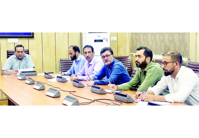 Comm Secy S&T Saurabh Bhagat chairing a meeting on Saturday.