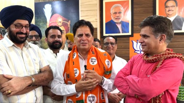 BJP president Ravinder Raina welcoming Sayeed Mureed Shah who joined the party at Jammu on Tuesday.