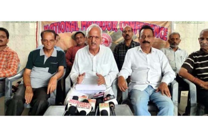 NMC president, Subash Shastri addressing a press conference at Jammu on Monday.