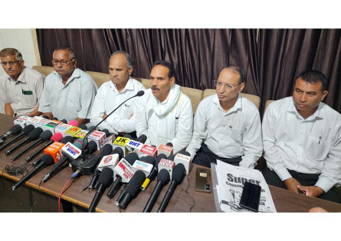 Members of Batwal community addressing a press conference in Jammu on Tuesday.