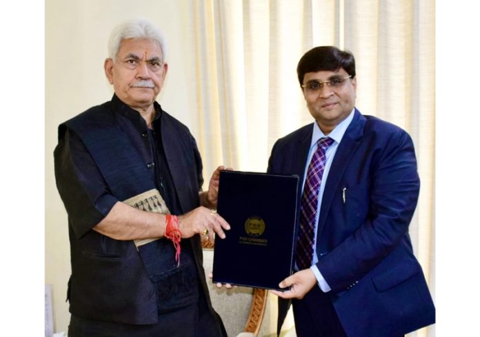Chairman PHDCCI, Jammu Chapter, Rahul Sahai hands over a memorandum to LG Manoj Sinha. Chairman PHDCCI, Jammu Chapter, Rahul Sahai hands over a memorandum to LG Manoj Sinha.
