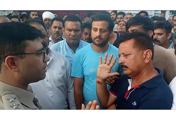 SDPO RS Pura, Nikhil Gogna listening to the grievances of the protestors at Arnia on Wednesday.