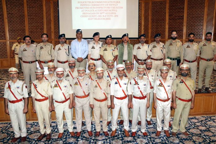 IGP Bhim Sen Tuti with the newly promoted officers in Srinagar on Thursday. IGP Bhim Sen Tuti with the newly promoted officers in Srinagar on Thursday.