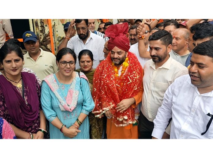 BJP candidate Rakesh Singh on way to file papers for Ramban seat on Tuesday. — Excelsior/Pervaiz