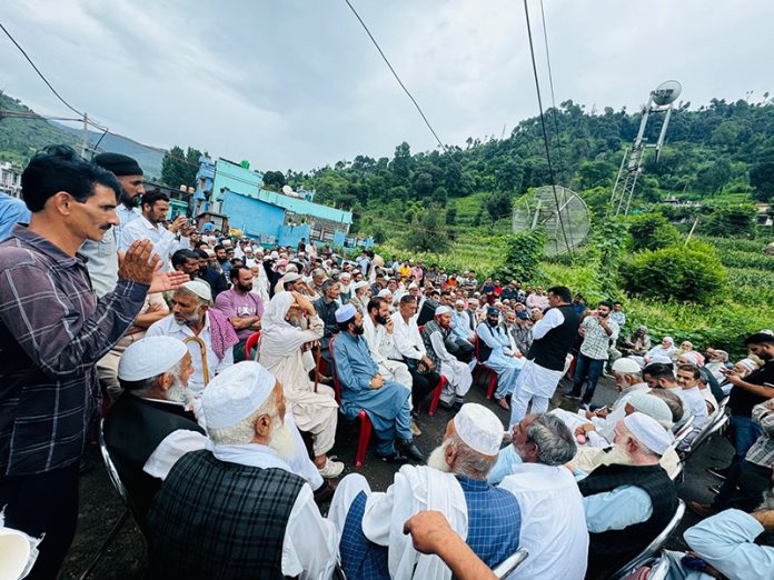 Supporters of NC leader Muzzafar Khan (Retd Judge) holding protest at Manjakote in Rajouri. Supporters of NC leader Muzzafar Khan (Retd Judge) holding protest at Manjakote in Rajouri.