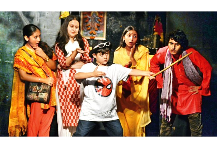 A scene from play 'Chandi Ka Chamcha' staged at Jammu on Sunday.