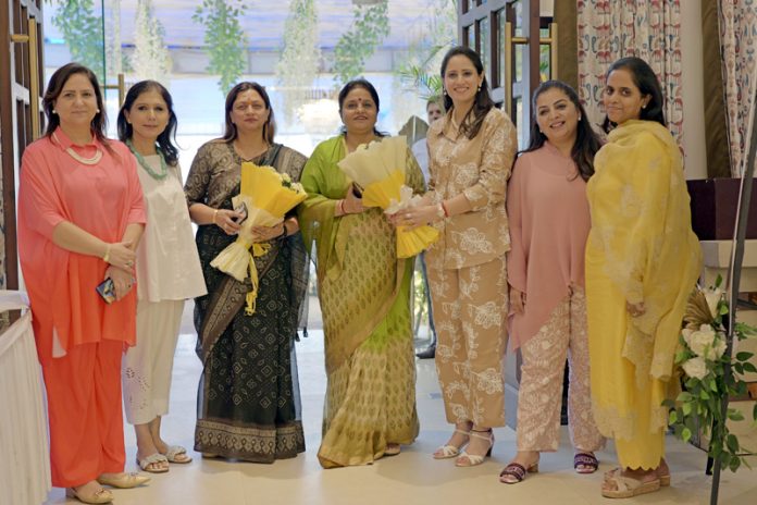 Senior BJP leader, Priya Sethi posing along with other members of FICCI FLO JKL in Jammu on Sunday.