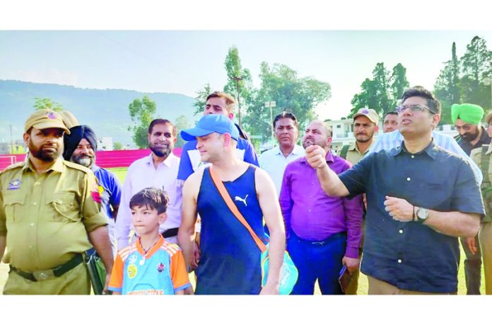 DEO Poonch Vikas Kundal flying kite at Sports Stadium on Sunday.