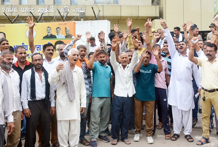BJP activists and local people from Chhamb constituency protesting in front of party office at Jammu on Wednesday. — Excelsior/Rakesh