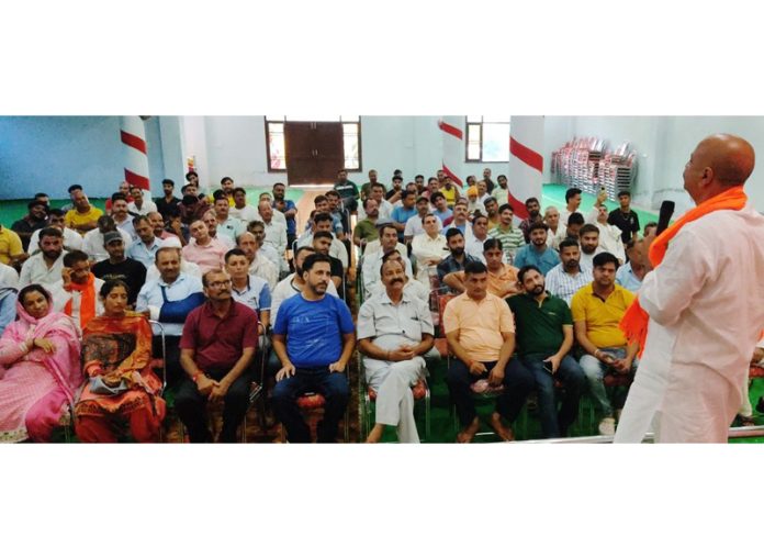 BJP vice president and party candidate for Jammu East Yudhvir Sethi addressing an election meeting at Jagti on Saturday.