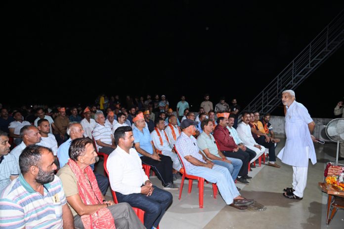 Sham Lal Sharma addressing a public meeting in Jammu North Assembly constituency on Saturday.