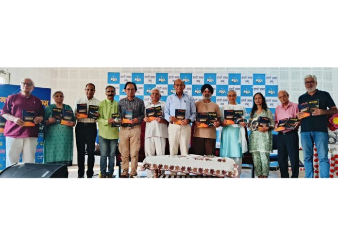 Dignitaries releasing writer Jagdeep Dubey's books in Jammu on Sunday.