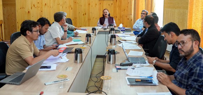 Dr Pawan Kotwal chairing a meeting at Leh.