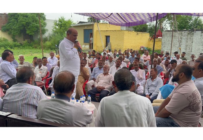 Ex-DyCM, Tara Chand addressing public meeting in Pargwal area of Akhnoor on Sunday.