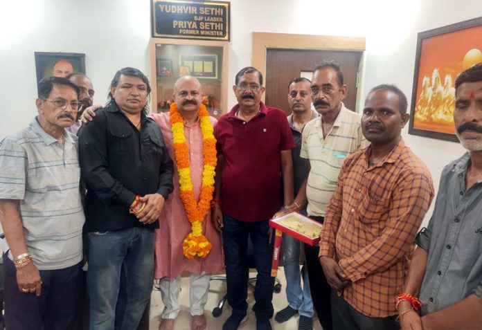 Traders Associations during a meeting with BJP vice president Yudhvir Sethi at Jammu on Tuesday.