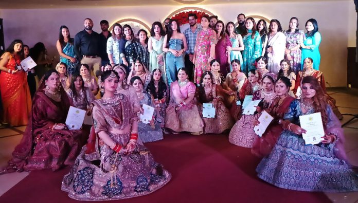 Isha Sharma, Mrs Universal India-2022 posing along with the contestants during a function in Jammu on Thursday. Isha Sharma, Mrs Universal India-2022 posing along with the contestants during a function in Jammu on Thursday.